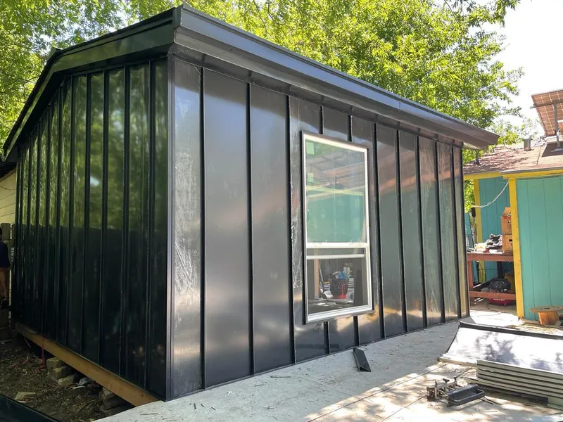 Black standing seam metal wall panels for Metal Roof Installation in Fuquay